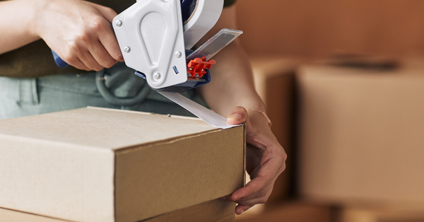 taping up a cardboard box