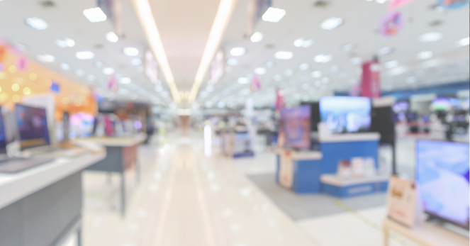 image showing the aisles of a consumer electronics store